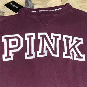 PINK crew neck sweater.